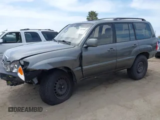 2001 Lexus LX 470 z VIN JTJHT00WX13509489, wystawiony jako IAAI lot #42227083 z przebiegiem 360 283 mil mil oraz . Historia ofert i sprzedaży dostępna na DreamBid. Obrazek 14.