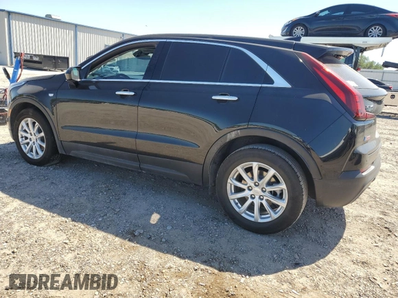 2023 Cadillac XT4 FWD Luxury z VIN 1GYAZAR46PF178003, wystawiony jako Copart lot #52024665 z przebiegiem 42 000 mil mil oraz Szkoda całkowita • Salvage title. Historia ofert i sprzedaży dostępna na DreamBid. Obrazek 2.