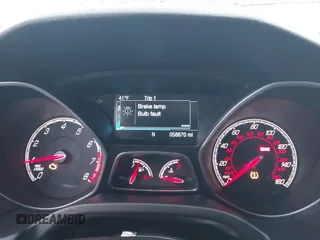2014 Ford Focus ST with VIN 1FADP3L91EL441379, listed as a IAAI auction lot 41092598 with 58,670 mi miles and . Bid and sale history available at carsss.com. Image 7.