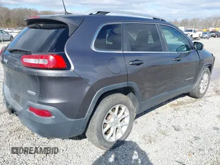 2018 Jeep Cherokee Latitude Plus with VIN 1C4PJLLXXJD606504, listed as a IAAI auction lot 41731085 with 95,569 mi miles. Bid and sale history available at carsss.com. Image 4.