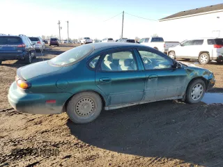 1997 Ford Taurus G with VIN 1FALP51U4VG297298, listed as a Copart auction lot 79660284 with 115,038 mi miles and Clean Title. Bid and sale history available at carsss.com. Image 3.