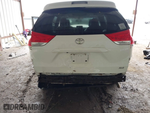 2014 Toyota Sienna XLE with VIN 5TDYK3DC6ES444121, listed as a IAAI auction lot 42110190 with 240,366 mi miles and . Bid and sale history available at DreamBid. Image 6.