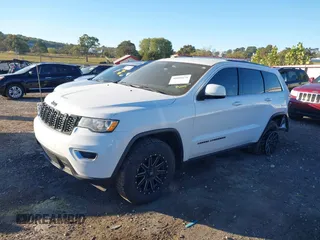 2017 Jeep Grand Cherokee Laredo with VIN 1C4RJEAG1HC903264, listed as a IAAI auction lot 40606675 with 144,106 mi miles. Bid and sale history available at carsss.com. Image 18.