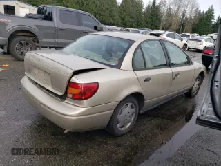 2001 Saturn SL z VIN 1G8ZH52851Z286886, wystawiony jako Copart lot #84883824 z przebiegiem Nie podano mil oraz Szkoda całkowita • Salvage title. Historia ofert i sprzedaży dostępna na DreamBid. Obrazek 3.