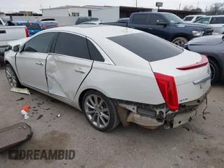 2014 Cadillac XTS Luxury with VIN 2G61M5S35E9303899, listed as a IAAI auction lot 41630891 with 1 mi miles. Bid and sale history available at carsss.com. Image 3.