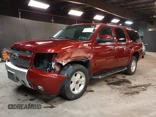 2010 Chevrolet Suburban LT z VIN 1GNUKJE32AR106197, wystawiony jako IAAI lot #42378134 z przebiegiem 106 479 mil mil oraz . Historia ofert i sprzedaży dostępna na DreamBid. Obrazek 19.