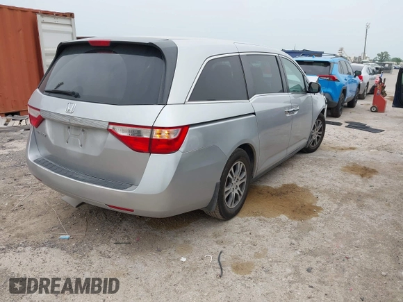 2012 Honda Odyssey EX with VIN 5FNRL5H47CB093480, listed as a IAAI auction lot 42067202 with 81,818 mi miles and . Bid and sale history available at carsss.com. Image 4.