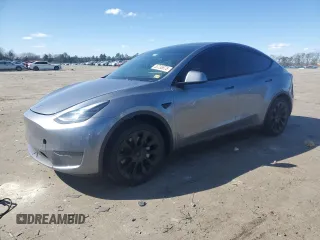 2025 Tesla Model Y Long Range with VIN 7SAYGDED0SF247561, listed as a Copart auction lot 50736875 with 9,094 mi miles and Salvage Title. Bid and sale history available at DreamBid. Image 1.
