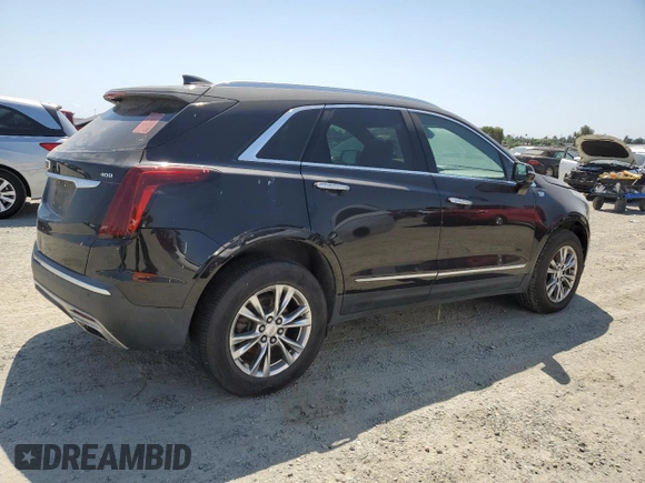 2020 Cadillac XT5 Premium Luxury AWD with VIN 1GYKNDRS6LZ129215, listed as a Copart auction lot 60238685 with 128,310 mi miles and Clean title. Bid and sale history available at DreamBid. Image 3.