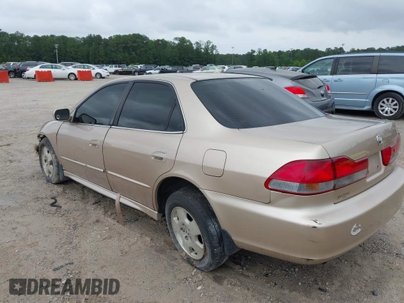2001 Honda Accord EX z VIN 1HGCG16561A080094, wystawiony jako IAAI lot #42230752 z przebiegiem 246 469 mil mil oraz . Historia ofert i sprzedaży dostępna na DreamBid. Obrazek 3.