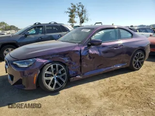 2024 BMW 2 Series 230i xDrive with VIN 3MW33CM04R8D91184, listed as a Copart auction lot 69080634 with 4,988 mi miles and Salvage title. Bid and sale history available at DreamBid. Image 1.