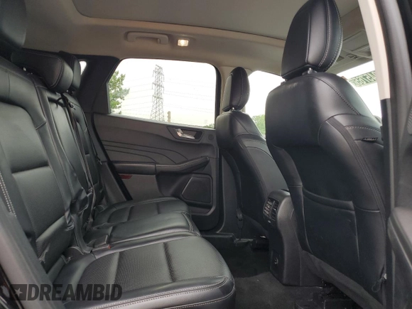 2021 Ford Escape Titanium with VIN 1FMCU9J97MUA58524, listed as a Copart auction lot 61045765 with 91,575 mi miles and Clean title. Bid and sale history available at DreamBid. Image 11.