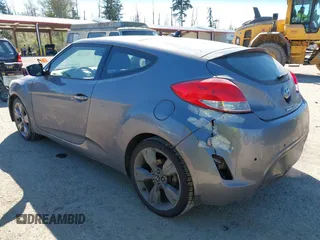 2013 Hyundai Veloster w/Black Int with VIN KMHTC6AD8DU103122, listed as a IAAI auction lot 42068175 with 123,512 mi miles. Bid and sale history available at carsss.com. Image 3.