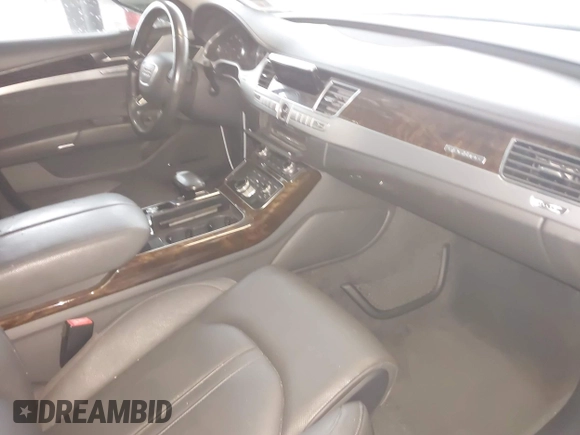 2012 Audi A8 with VIN WAUAVAFD9CN006499, listed as a IAAI auction lot 42461402 with 57,232 mi miles and . Bid and sale history available at DreamBid. Image 5.