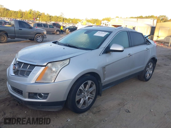 2012 Cadillac SRX Premium Collection with VIN 3GYFNFE36CS509048, listed as a IAAI auction lot 40636427 with 104,001 mi miles. Bid and sale history available at carsss.com. Image 2.