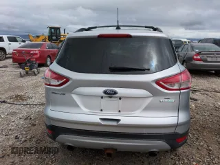 2016 Ford Escape SE z VIN 1FMCU0G91GUC59990, wystawiony jako Copart lot #56956395 z przebiegiem 112 706 mil mil oraz Szkoda całkowita • Salvage title. Historia ofert i sprzedaży dostępna na DreamBid. Obrazek 6.