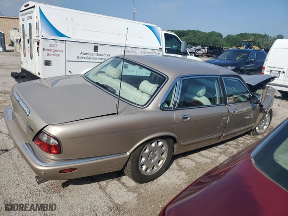 2002 Jaguar XJ VDP with VIN SAJDA24CX2LF45014, listed as a Copart auction lot 56015444 with 0 mi miles and Salvage Title. Bid and sale history available at carsss.com. Image 3.