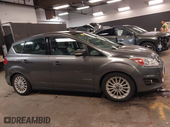 2013 Ford C-Max SEL z VIN 1FADP5BU9DL531704, wystawiony jako IAAI lot #42228841 z przebiegiem 91 808 mil mil oraz . Historia ofert i sprzedaży dostępna na DreamBid. Obrazek 13.