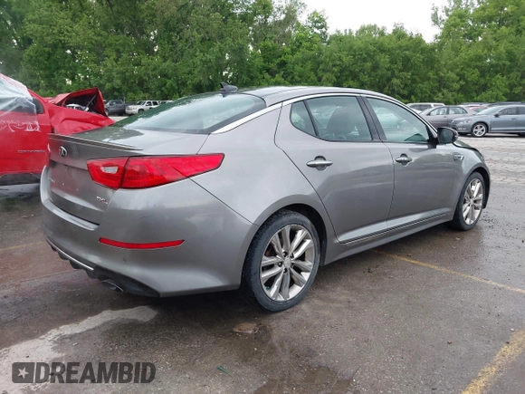 2014 Kia Optima SXL Turbo with VIN 5XXGR4A68EG303094, listed as a IAAI auction lot 42207175 with 105,521 mi miles and . Bid and sale history available at DreamBid. Image 4.
