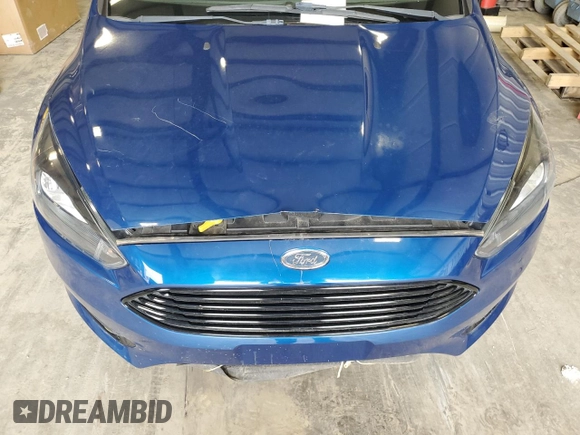 2018 Ford Focus SE z VIN 1FADP3FE2JL332464, wystawiony jako Copart lot #55649215 z przebiegiem 95 541 mil mil oraz Czysty tytuł • Clean title. Historia ofert i sprzedaży dostępna na DreamBid. Obrazek 11.