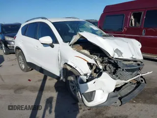 2015 Mazda CX-5 Sport z VIN JM3KE2BE3F0449722, wystawiony jako IAAI lot #41825810 z przebiegiem 181 949 mil mil oraz . Historia ofert i sprzedaży dostępna na DreamBid. Obrazek 1.