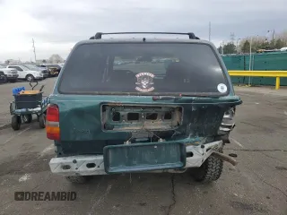 1996 Jeep Grand Cherokee Laredo with VIN 1J4GZ58S6TC165636, listed as a Copart auction lot 51485235 with 266,873 mi miles and Salvage Title. Bid and sale history available at carsss.com. Image 6.
