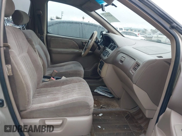 2001 Toyota Sienna CE with VIN 4T3ZF19C51U329489, listed as a IAAI auction lot 41535721 with 218,839 mi miles. Bid and sale history available at carsss.com. Image 5.
