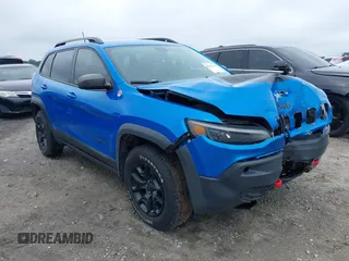 2019 Jeep Cherokee Trailhawk with VIN 1C4PJMBX0KD141577, listed as a IAAI auction lot 42413454 with 122,386 mi miles and . Bid and sale history available at DreamBid. Image 1.