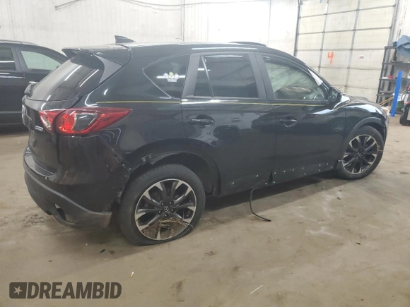 2016 Mazda CX-5 Grand Touring with VIN JM3KE4DY0G0854568, listed as a Copart auction lot 53259345 with 74,264 mi miles and Salvage Title. Bid and sale history available at carsss.com. Image 3.