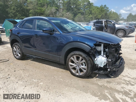 2024 Mazda CX-30 S Carbon Edition with VIN 3MVDMBCM2RM678452, listed as a Copart auction lot 61675535 with 9,573 mi miles and Salvage title. Bid and sale history available at DreamBid. Image 4.