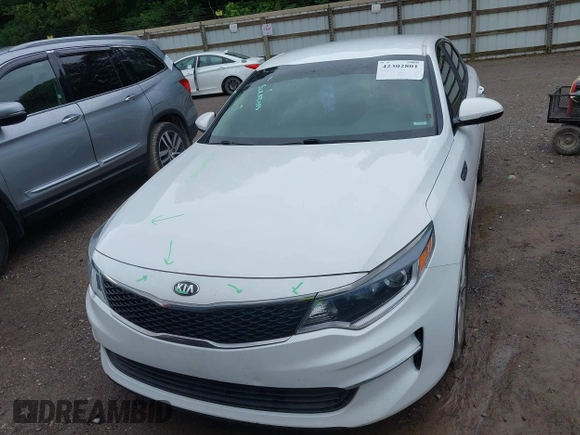 2018 Kia Optima S with VIN 5XXGT4L36JG265878, listed as a IAAI auction lot 42302801 with 101,927 mi miles and . Bid and sale history available at DreamBid. Image 13.