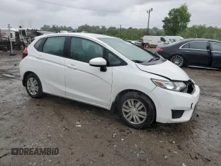 2015 Honda Fit LX with VIN 3HGGK5H57FM722000, listed as a Copart auction lot 57331455 with 140,546 mi miles and Salvage title. Bid and sale history available at DreamBid. Image 4.
