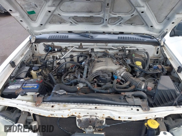 2004 Nissan Frontier XE z VIN 1N6ED29X54C475425, wystawiony jako IAAI lot #42292779 z przebiegiem 156 000 mil mil oraz . Historia ofert i sprzedaży dostępna na DreamBid. Obrazek 10.
