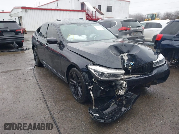 2018 BMW 6 Series 640i xDrive with VIN WBAJV6C55JBK07051, listed as a IAAI auction lot 41505732 with 96,172 mi miles and . Bid and sale history available at carsss.com. Image 6.