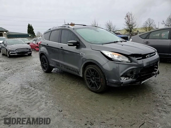 2015 Ford Escape Titanium with VIN 1FMCU9J92FUA62323, listed as a Copart auction lot 85826724 with 108,315 mi miles and Salvage Title. Bid and sale history available at DreamBid. Image 11.