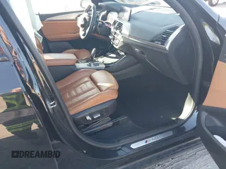 2020 BMW X3 M40i with VIN 5UXTY9C04LL304634, listed as a IAAI auction lot 41821262 with 71,731 mi miles and . Bid and sale history available at DreamBid. Image 5.