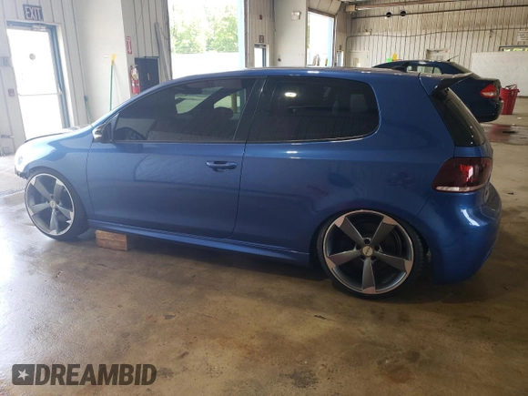 2012 Volkswagen Golf w/Sunroof & Navi z VIN WVWRF7AJ3CW282187, wystawiony jako Copart lot #60169325 z przebiegiem 137 822 mil mil oraz Szkoda całkowita • Salvage title. Historia ofert i sprzedaży dostępna na DreamBid. Obrazek 2.