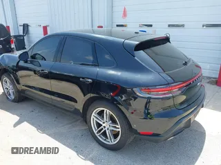 2022 Porsche Macan with VIN WP1AA2A51NLB05822, listed as a IAAI auction lot 39567077 with 54,527 mi miles. Bid and sale history available at carsss.com. Image 3.