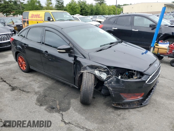 2016 Ford Focus SE with VIN 1FADP3F20GL303902, listed as a Copart auction lot 61374325 with 149,265 mi miles and Salvage title. Bid and sale history available at DreamBid. Image 4.