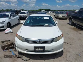 2012 Honda Civic LX z VIN 2HGFB2F57CH536142, wystawiony jako IAAI lot #42194088 z przebiegiem 108 293 mil mil oraz . Historia ofert i sprzedaży dostępna na DreamBid. Obrazek 11.