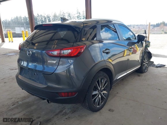 2017 Mazda CX-3 Grand Touring with VIN JM1DKFD70H0150496, listed as a IAAI auction lot 41746038 with 108,091 mi miles. Bid and sale history available at carsss.com. Image 4.