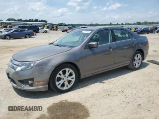 2012 Ford Fusion SE z VIN 3FAHP0HA0CR328833, wystawiony jako Copart lot #57631955 z przebiegiem 94 613 mil mil oraz Szkoda całkowita • Salvage title. Historia ofert i sprzedaży dostępna na DreamBid. Obrazek 1.