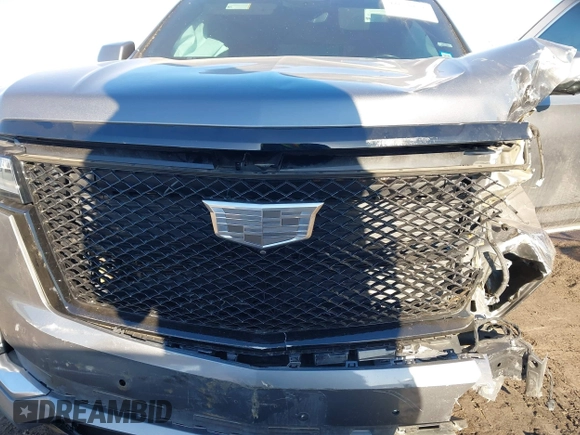 2021 Cadillac Escalade Premium Luxury z VIN 1GYS4CKL2MR231788, wystawiony jako IAAI lot #41630686 z przebiegiem 56 672 mil mil oraz . Historia ofert i sprzedaży dostępna na DreamBid. Obrazek 10.