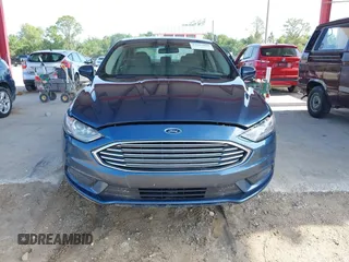2018 Ford Fusion SE z VIN 3FA6P0HD8JR201052, wystawiony jako IAAI lot #42367050 z przebiegiem 90 502 mil mil oraz . Historia ofert i sprzedaży dostępna na DreamBid. Obrazek 6.
