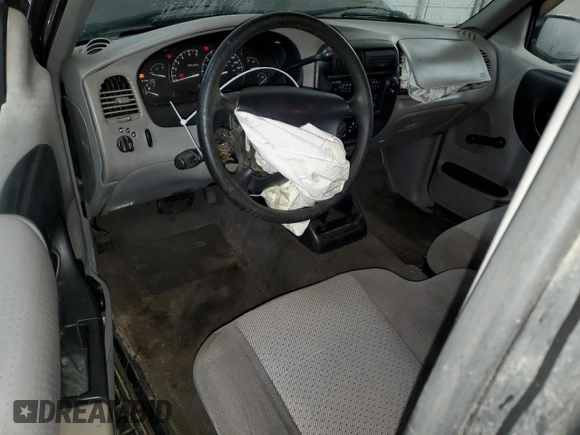 2000 Mazda B-Series 2WD Truck SE with VIN 4F4YR16V8YTM12086, listed as a Copart auction lot 82609244 with 297,354 mi miles and Salvage Title. Bid and sale history available at carsss.com. Image 8.