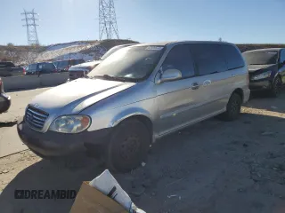 2003 Kia Sedona LX with VIN KNDUP131236371153, listed as a Copart auction lot 80989974 with 205,181 mi miles and Salvage Title. Bid and sale history available at carsss.com. Image 1.