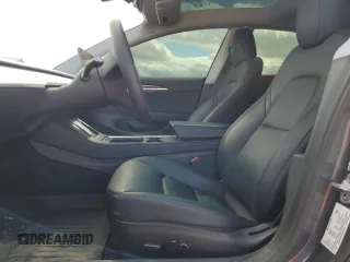2023 Tesla Model 3 with VIN 5YJ3E1EA3PF707076, listed as a Copart auction lot 48993105 with 30,525 mi miles and Salvage Title. Bid and sale history available at DreamBid. Image 7.
