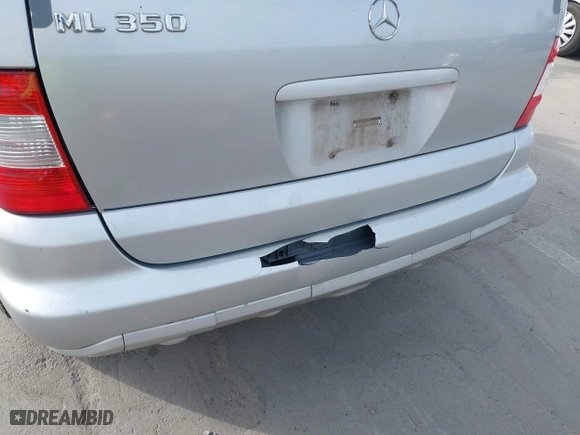 2003 Mercedes-Benz M-Class 3.7L with VIN 4JGAB57EX3A435535, listed as a IAAI auction lot 42099551 with 205,226 mi miles. Bid and sale history available at carsss.com. Image 6.