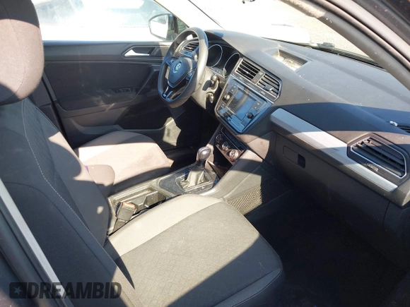 2021 Volkswagen Tiguan S with VIN 3VV1B7AX7MM038431, listed as a IAAI auction lot 42726529 with 82,289 mi miles and . Bid and sale history available at DreamBid. Image 5.