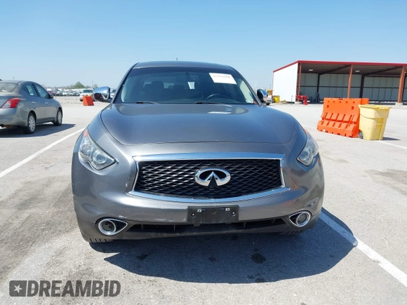 2015 Infiniti QX70 with VIN JN8CS1MW1FM481233, listed as a IAAI auction lot 41976458 with 134,875 mi miles and . Bid and sale history available at DreamBid. Image 12.